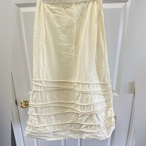 Krista Larson mid-length cream skirt